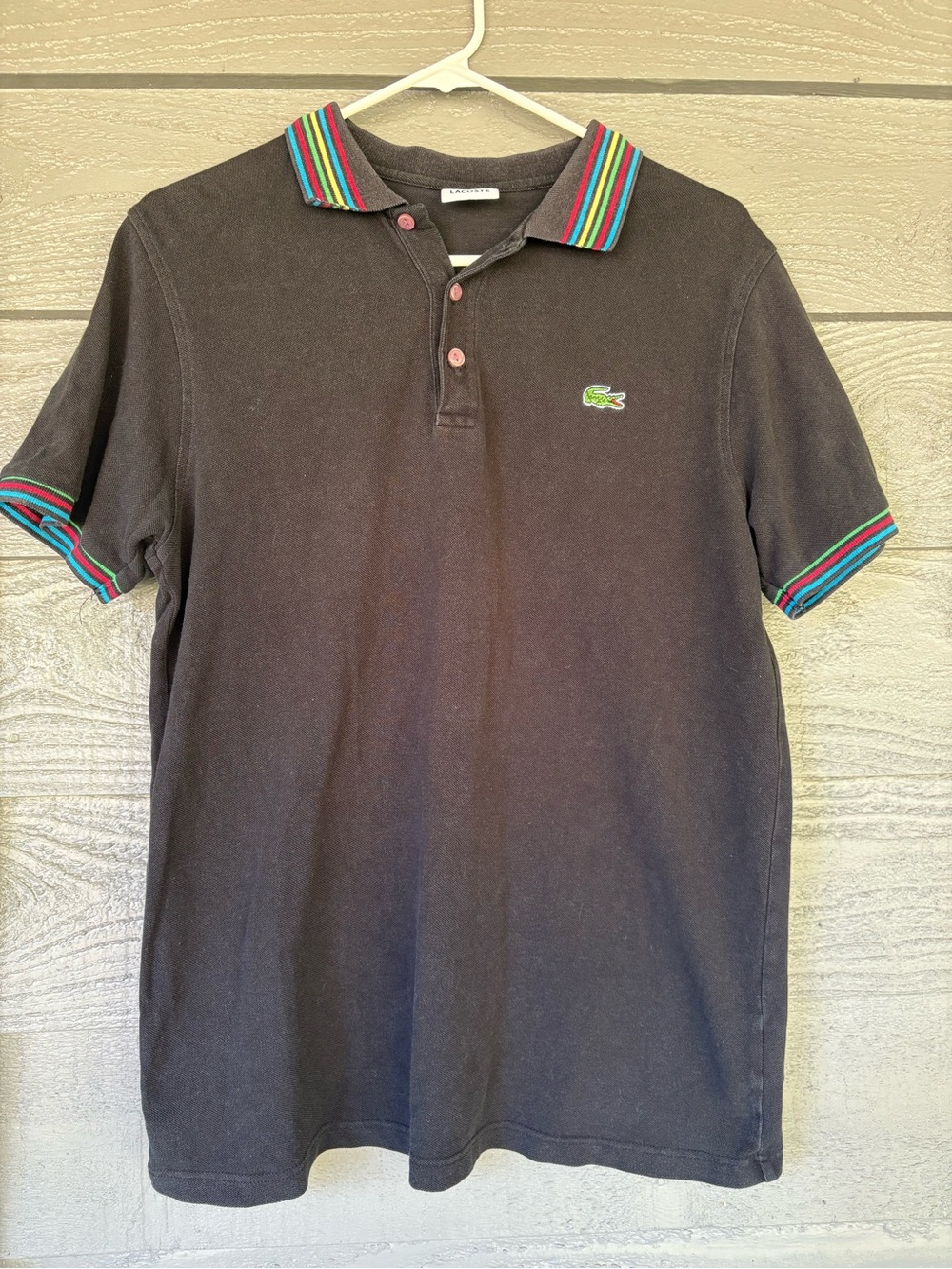 Vintage Lacoste Men's Black Polo with Multicolor Stripe Trim